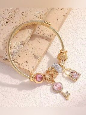 New! Gold Bracelet with Pink and Clear Crystal Charms